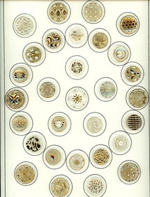 A card of division three glass buttons.
