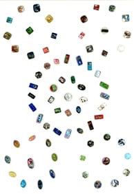 A card of division one foil imbedded glass buttons