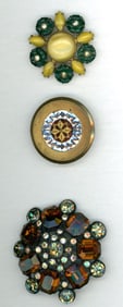 A small card of division 1 & 3 glass in metal buttons