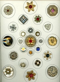 A card of division three "Glitz" jeweled buttons