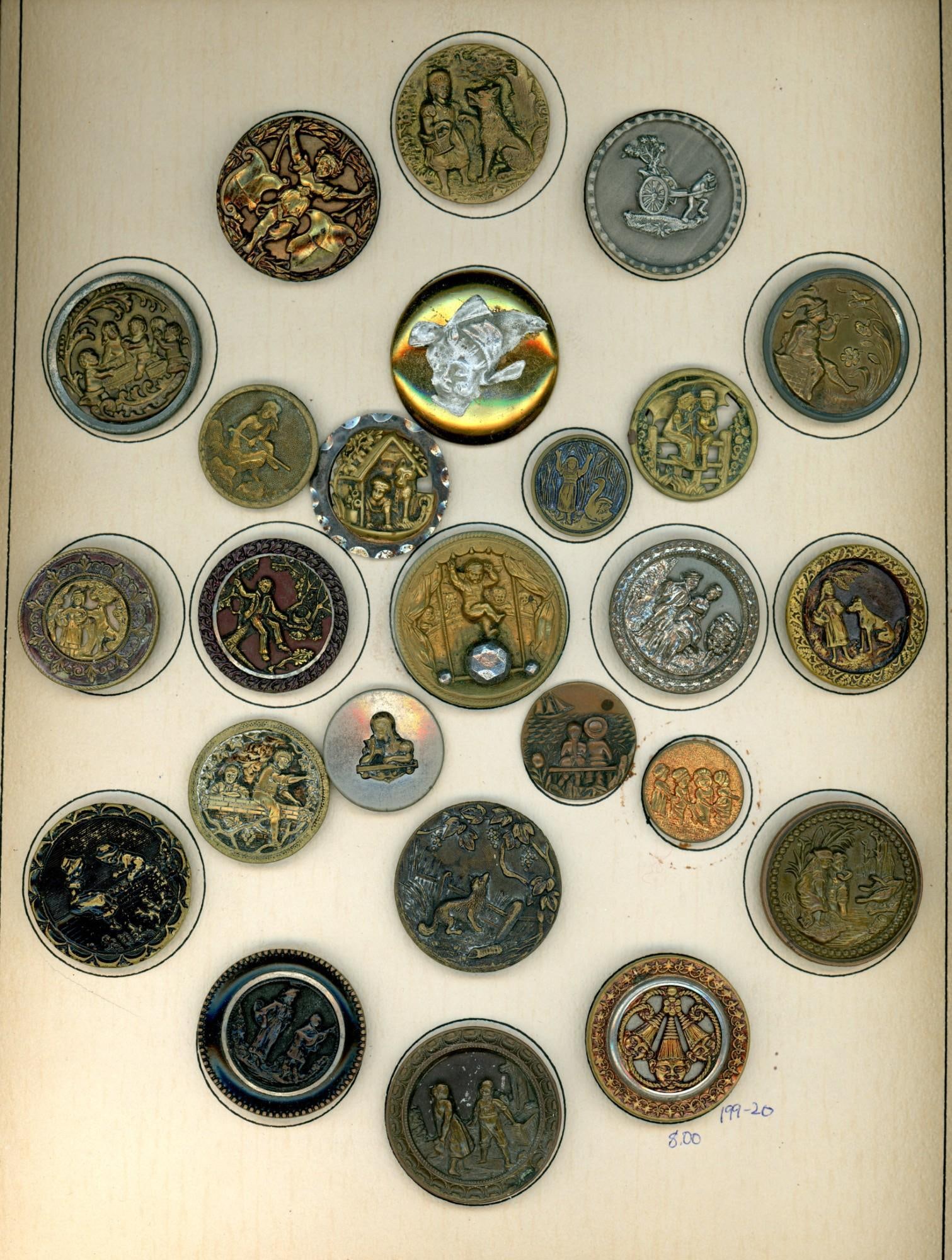 A card of division one metal pictorial buttons (1 of 4)