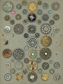 A card of division one mostly steel trimmed buttons