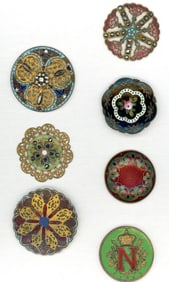 A small card of division one enamel buttons