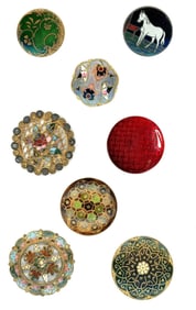 A small card of division one enamel buttons