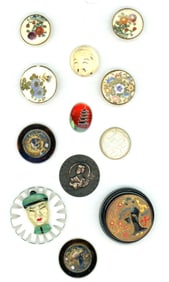 A small card of division 1 assorted material buttons