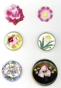 A small card of division three ceramic buttons