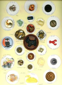 A card of division 1 & 3 assorted animal buttons