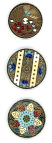 A small card of division one steel cup buttons