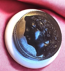 A division three two piece make-up button