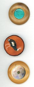 A small card of studio artist buttons
