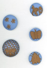 A small card of division three studio artist buttons