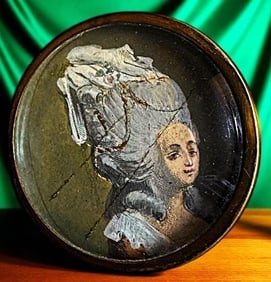 A division one pictorial under glass button