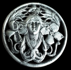 A division one pierced pictorial silver button