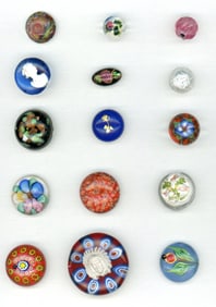 A small card of assorted artist paperweight buttons