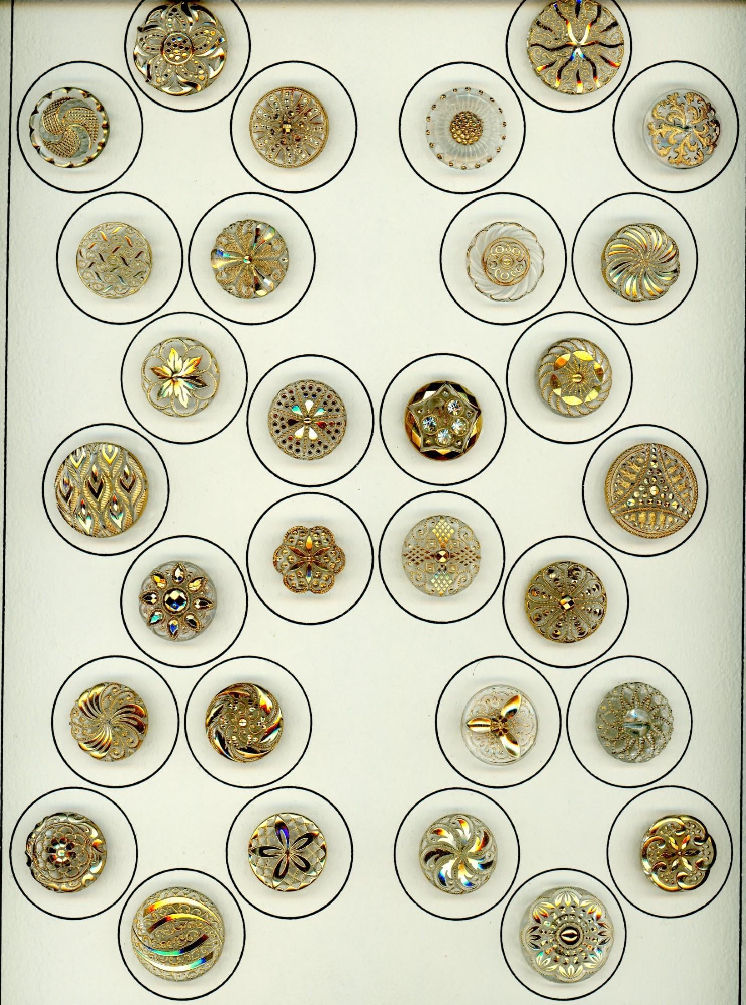 A card of division three glass buttons. (1 of 2)