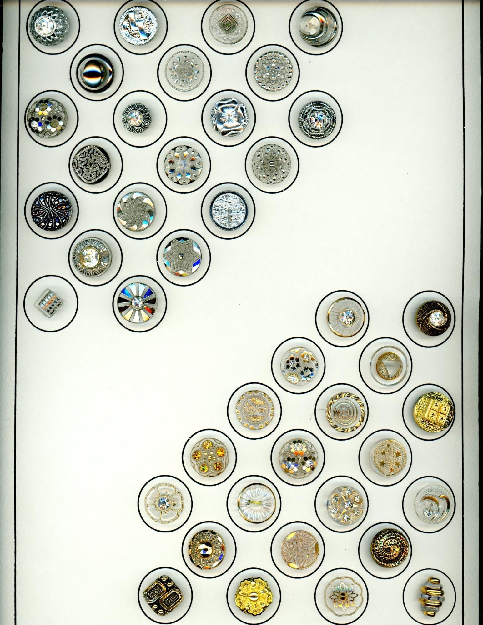 A card of division three glass buttons. (1 of 3)