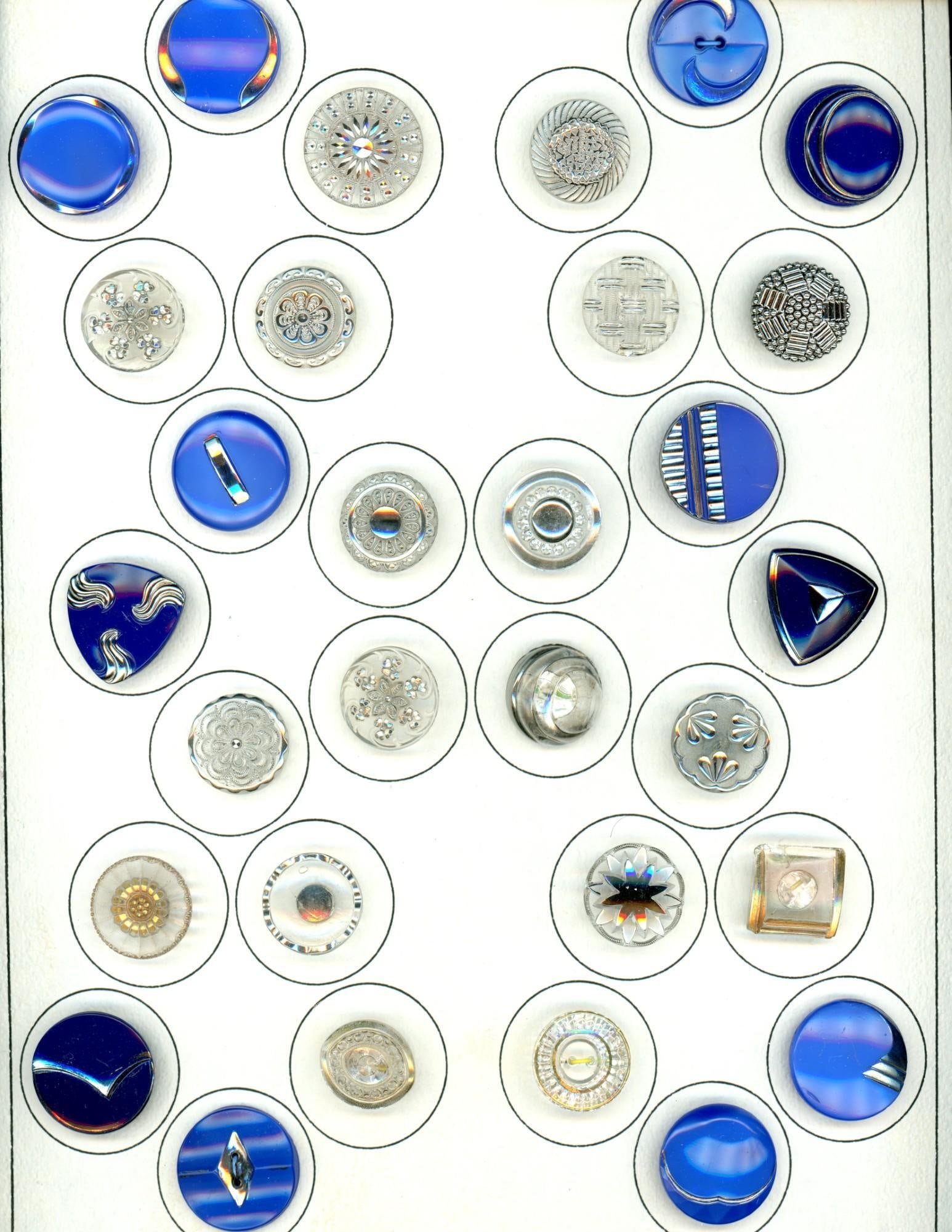 A card of division three glass buttons. (1 of 2)