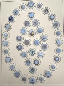 A card of division three glass buttons.