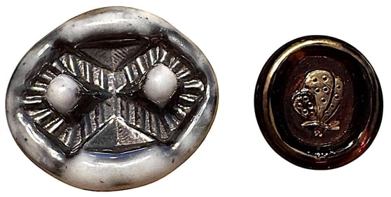 A small card of division three English glass buttons