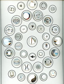 A card of division three glass buttons.
