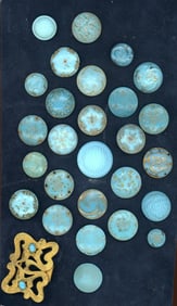 A small card of division one glass buttons
