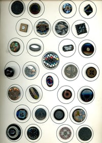A card of division one black glass buttons