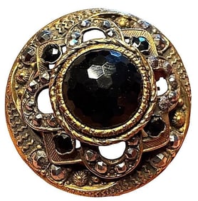 A division one glass in metal button