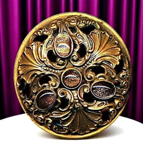 A division one large jeweled pierced button