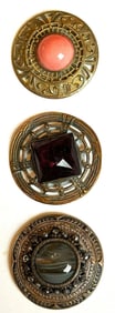 A small card of division one Glass in metal buttons