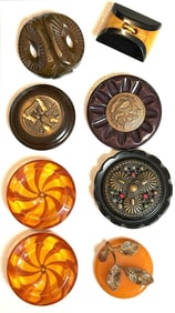 A small card of division three Bakelite Buttons