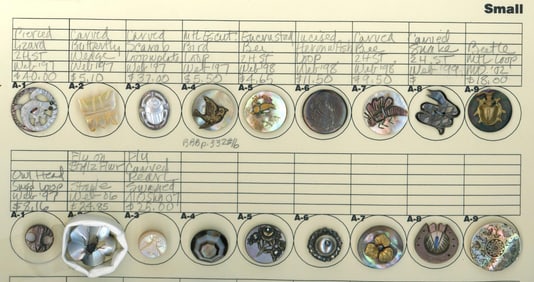 A card of division one pearl buttons