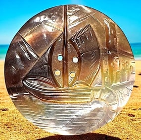 A division one carved and shaded pearl pictorial button