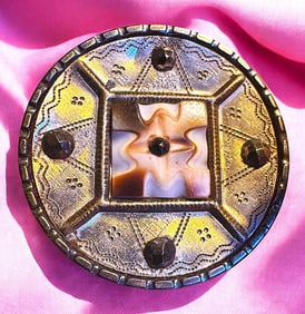 A division one shell centered steel cup button