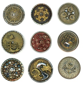 A small card of division one steel cup buttons