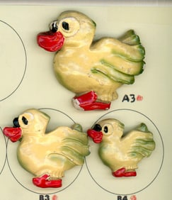 A small card of division three Plaster buttons