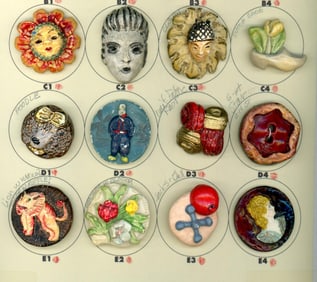 A partial card of division three Plaster buttons