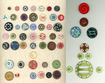 A card & a half of div 3 celluloid buttons