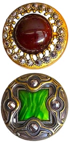 A small card of division one Glass in metal buttons