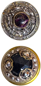 A small card of division one glass in metal buttons