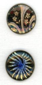 A small card of division one glass in metal buttons