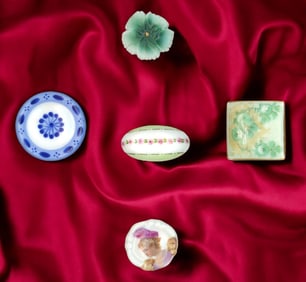 A small card of division one & three ceramic buttons