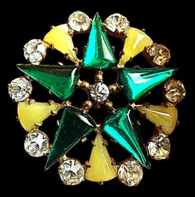 A division one glass in metal button