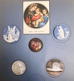 A card of division three assorted material buttons