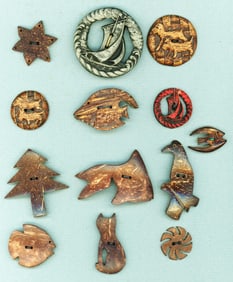 A card of division three mostly Coconut shell buttons