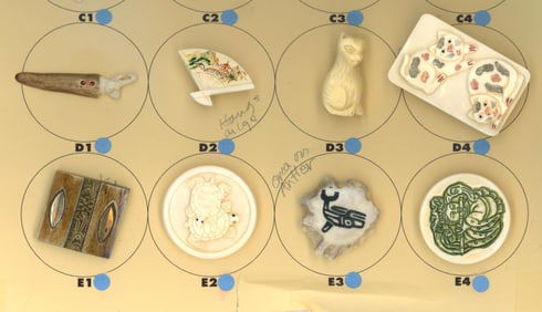A small card of division 1 & 3 natural material buttons