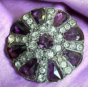 A division one colorful jeweled button