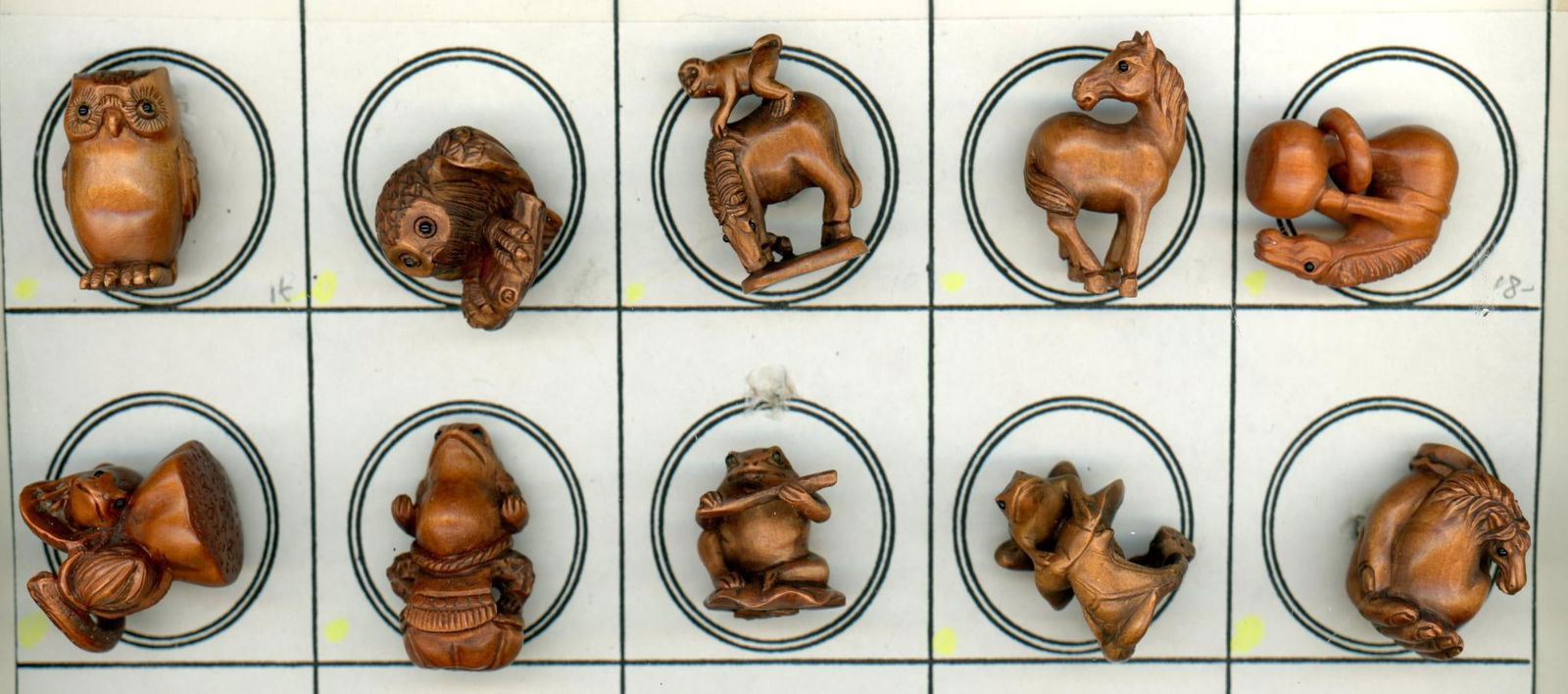 A partial card of division three Boxwood buttons (1 of 4)