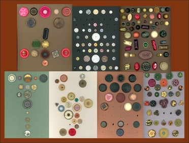 A box lot of assorted plastic carded buttons