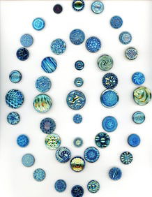 A card of division three Aurora Luster glass buttons