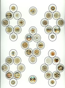 A card of division three glass buttons.